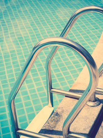 Swimming pool with stairs ( Filtered image processed vintage effect. )